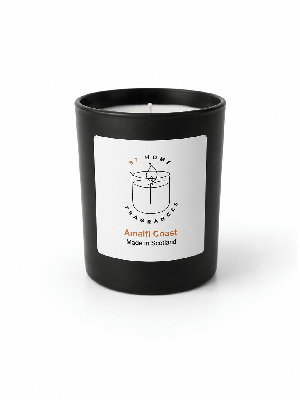 A black glass jar candle with a white label reading 'S7 HOME FRAGRANCE Amalfi Coast Made in Scotland' on a clean white background.