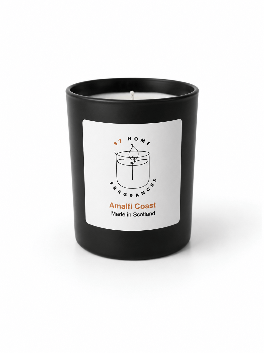 A black glass jar candle with a white label reading 'S7 HOME FRAGRANCE Amalfi Coast Made in Scotland' on a clean white background.