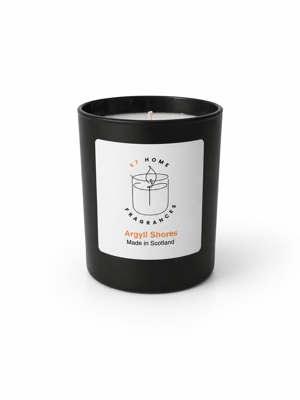 A black glass jar candle with a white label reading 'S7 Home Fragrances' and 'Argyll Shores Made in Scotland' on a clean white background.