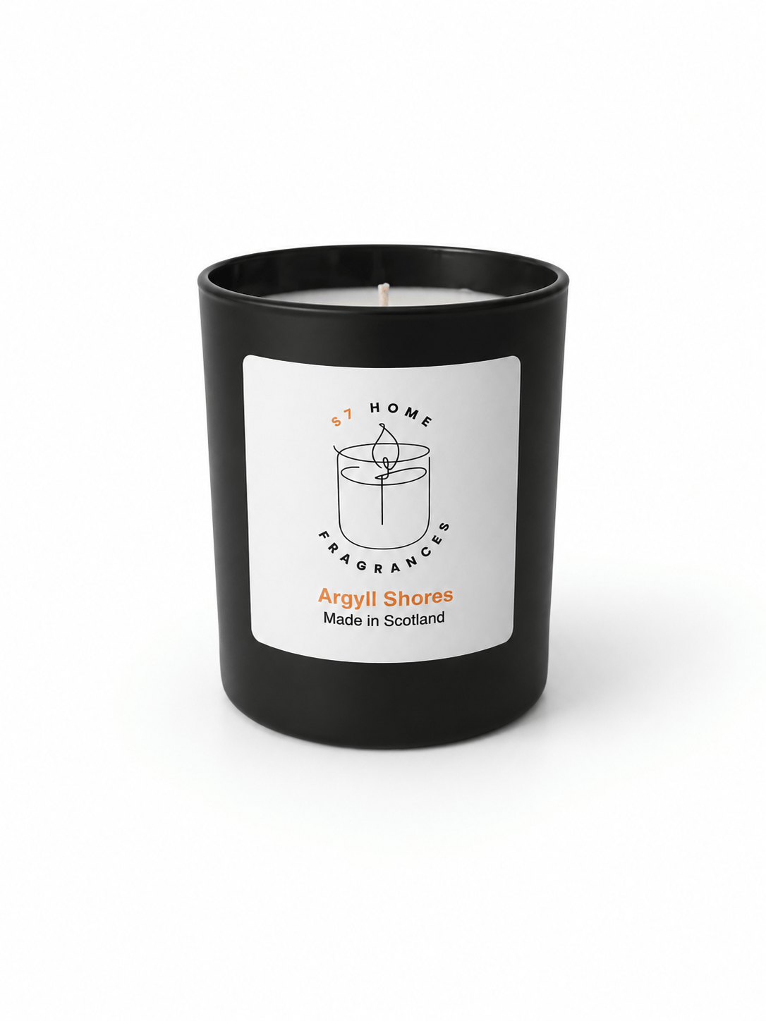 A black glass jar candle with a white label reading 'S7 Home Fragrances' and 'Argyll Shores Made in Scotland' on a clean white background.