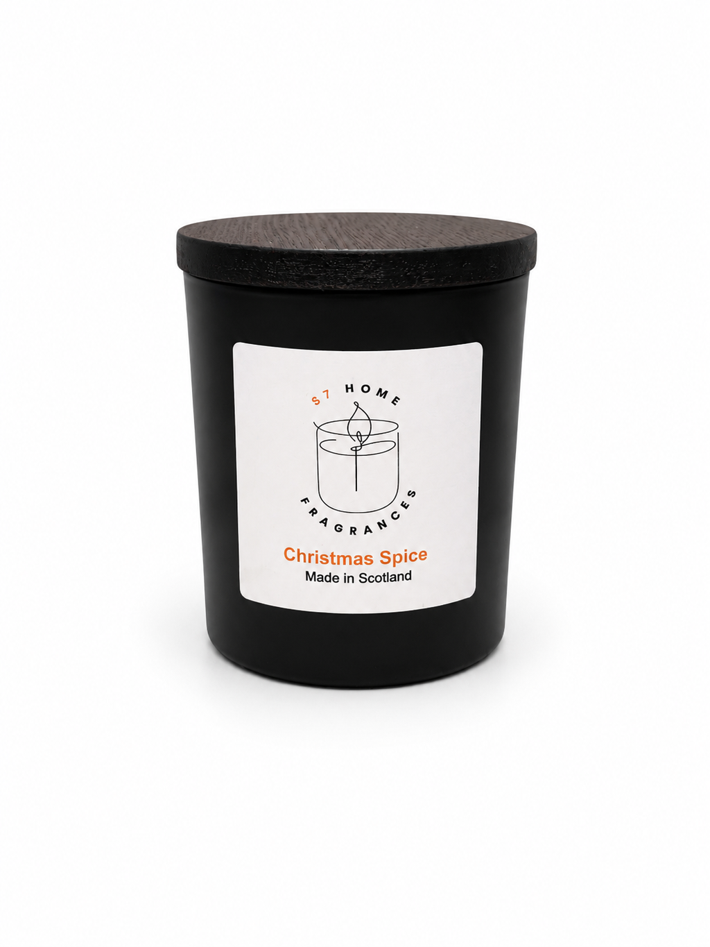Christmas Spice candle in a black jar with a white label and a black wooden jar topper on a white background