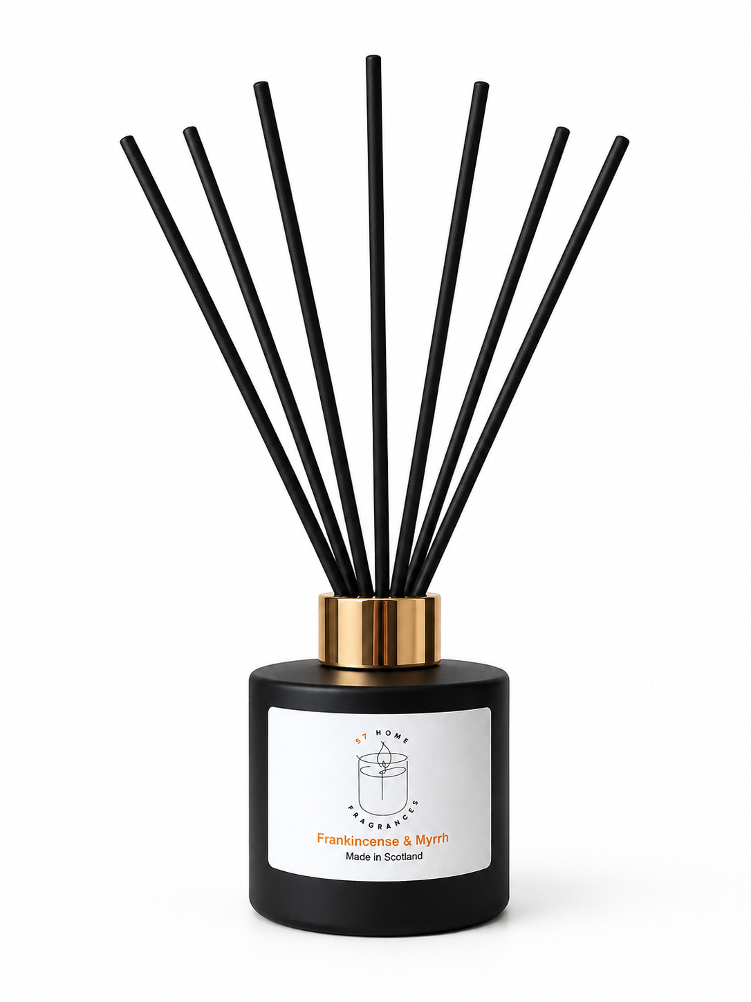 A reed diffuser bottle in matte black with a gold collar and black reeds, featuring a white label with a gift box icon and the text 'Frankincense & Myrrh' and 'Made in Scotland'.