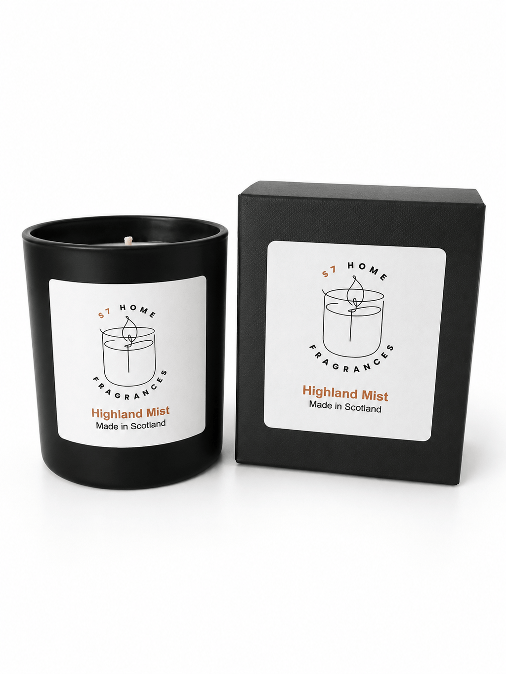 A black scented candle jar with a white label next to its black retail box. The label reads 'S7 HOME Fragrances' and 'Highland Mist Made in Scotland'.