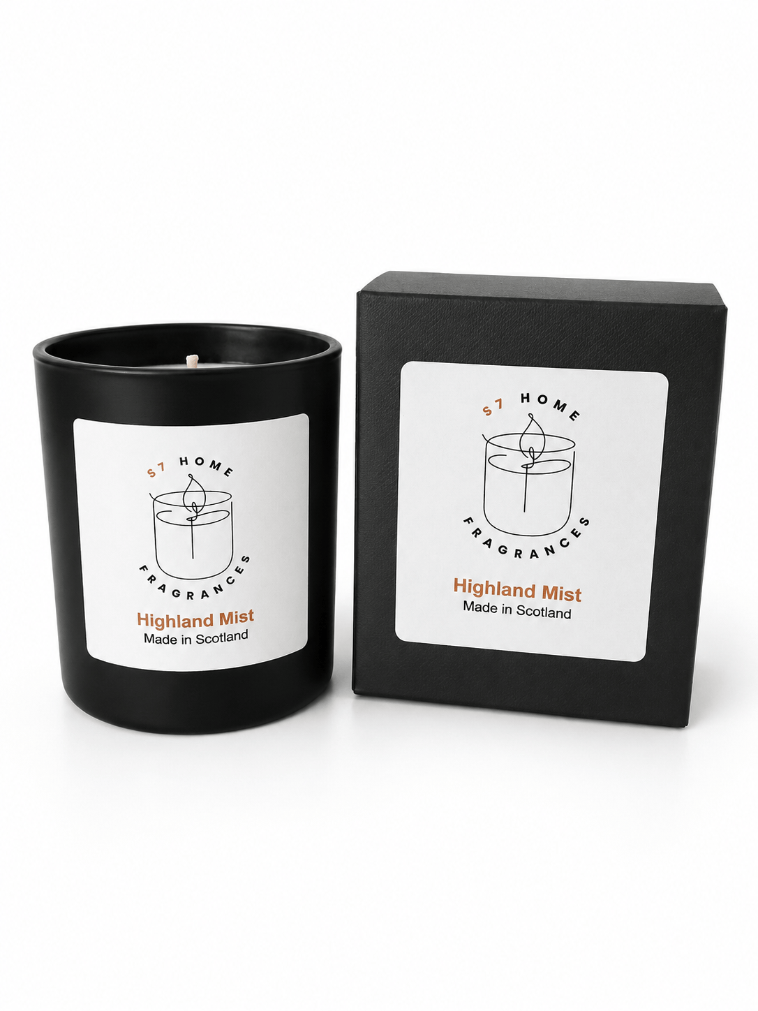 A black scented candle jar with a white label next to its black retail box. The label reads 'S7 HOME Fragrances' and 'Highland Mist Made in Scotland'.