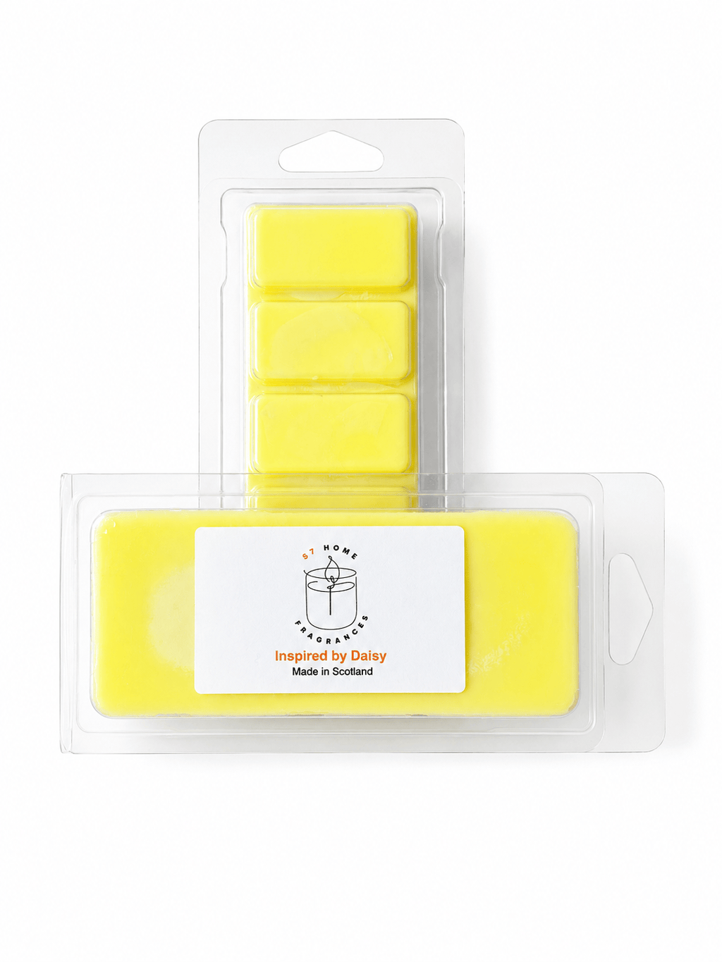 Yellow wax melts in clear plastic packaging, featuring a larger rectangular bar in the front with a white label reading 'Inspired by Daisy' and 'Made in Scotland' and five smaller rectangular bars behind it.