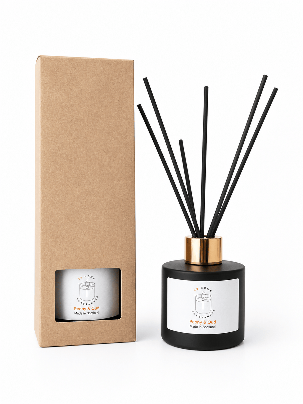 A reed diffuser bottle with black reeds, a black glass base, and a gold collar, shown next to its brown kraft paper box. Both items feature a white label with a simple line drawing of a gift box and the text 'Peony & Oud' and 'Made in Scotland'.