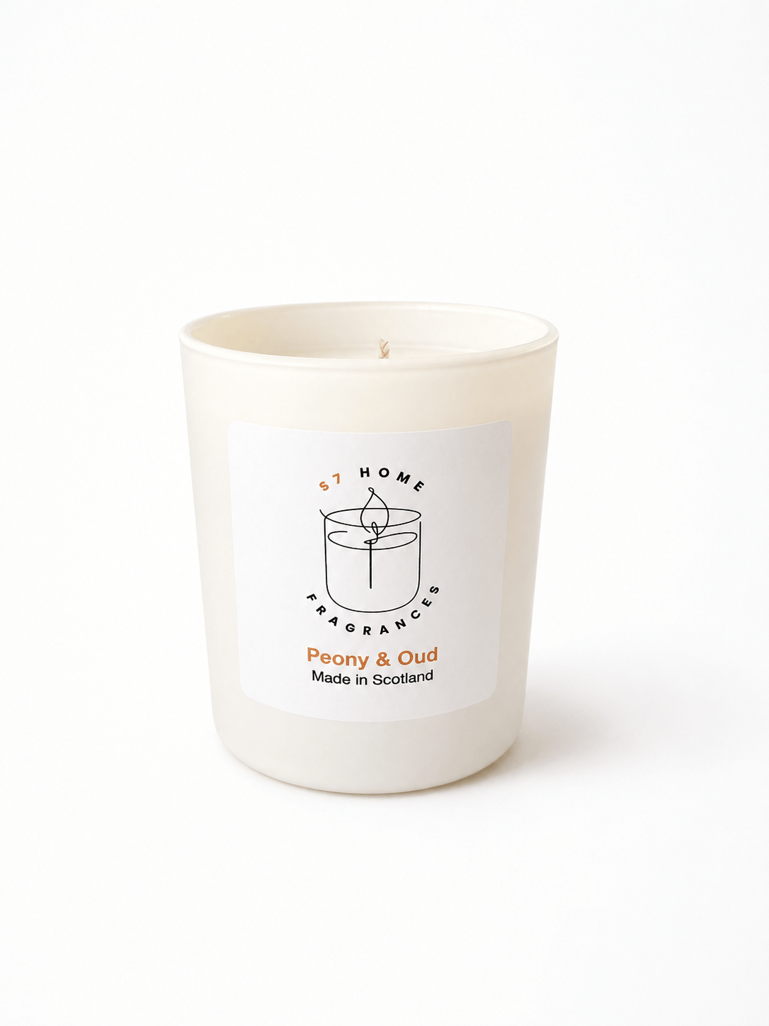 A white glass jar candle with a white label reading 'S7 HOME FRAGRANCES Peony & Oud Made in Scotland' on a clean white background.