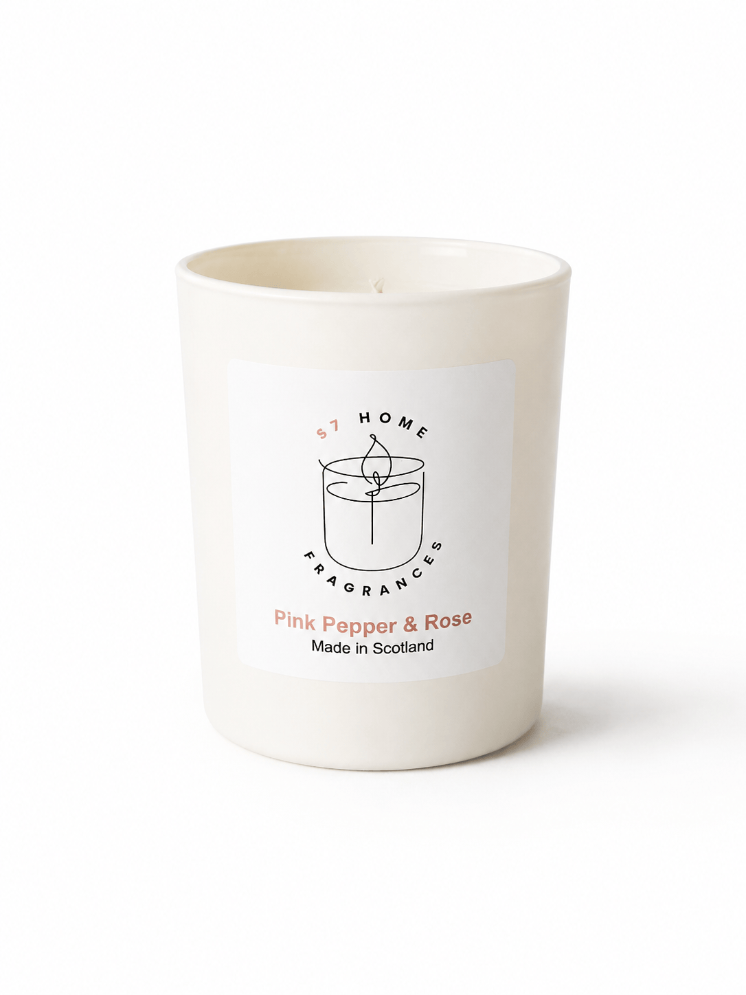 An off-white ceramic candle jar with a white label reading 'S7 HOME Fragrances' and 'Pink Pepper & Rose Made in Scotland' on a clean white background.
