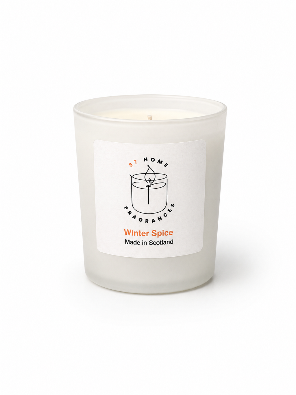 Winter Spice candle in a white jar with a white label on a white background